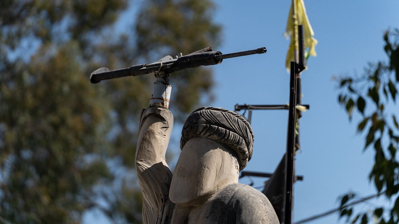 A monument depicting former Hezbollah Secretary-General Hassan Nasrallah stands in the town of Harouf, in the Nabatieh district of southern Lebanon, on May 14, 2026.