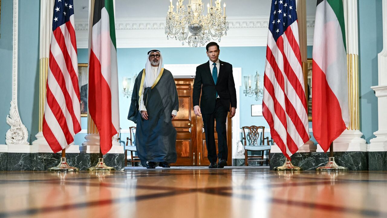 US Secretary of State Marco Rubio and Kuwaiti Foreign Minister Sheikh Jarrah Jaber Al-Ahmad Al-Sabah walk together during a brief appearance for the press as they meet at the State Department in Washington, DC, on June 4, 2026. 