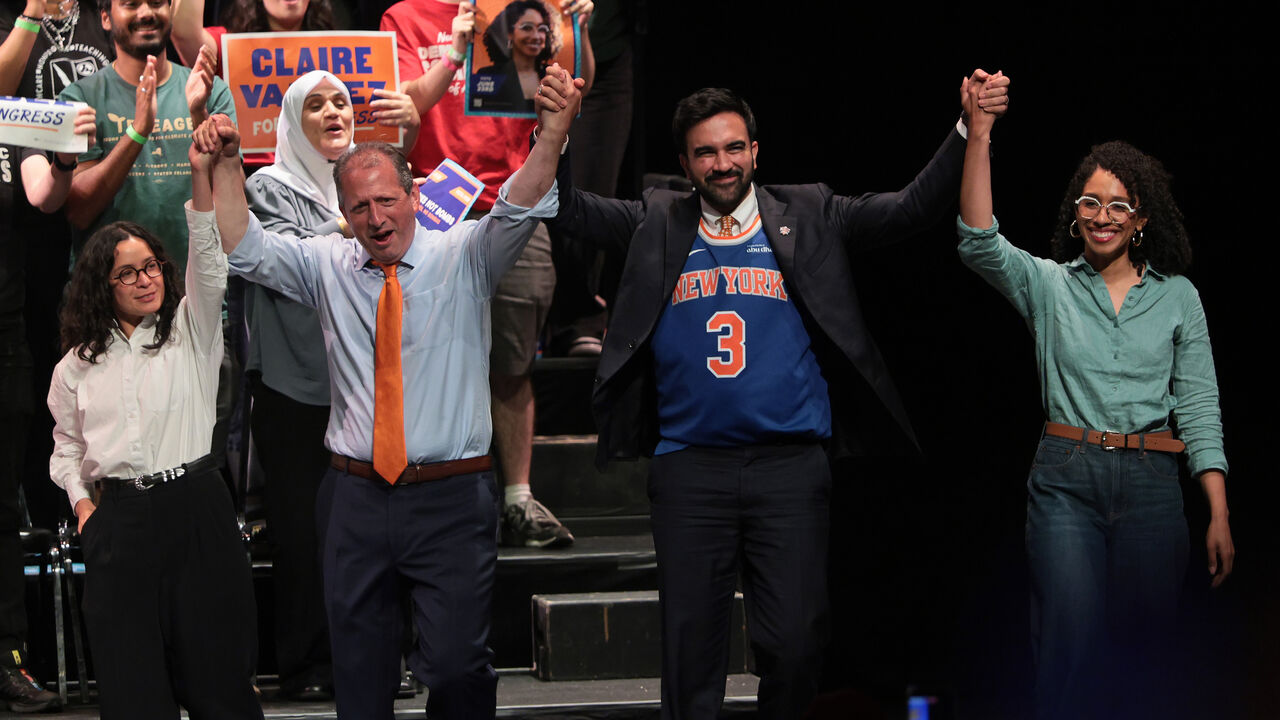  Congressional candidate Claire Valdez, Congressional candidate Brad Lander, Mayor Zohran Mamdani, and Congressional candidate Darializa Avila Chevalier raise their hands during a Get Out the Vote (GOTV) rally at King's Theater on June 18, 2026 in New York City.