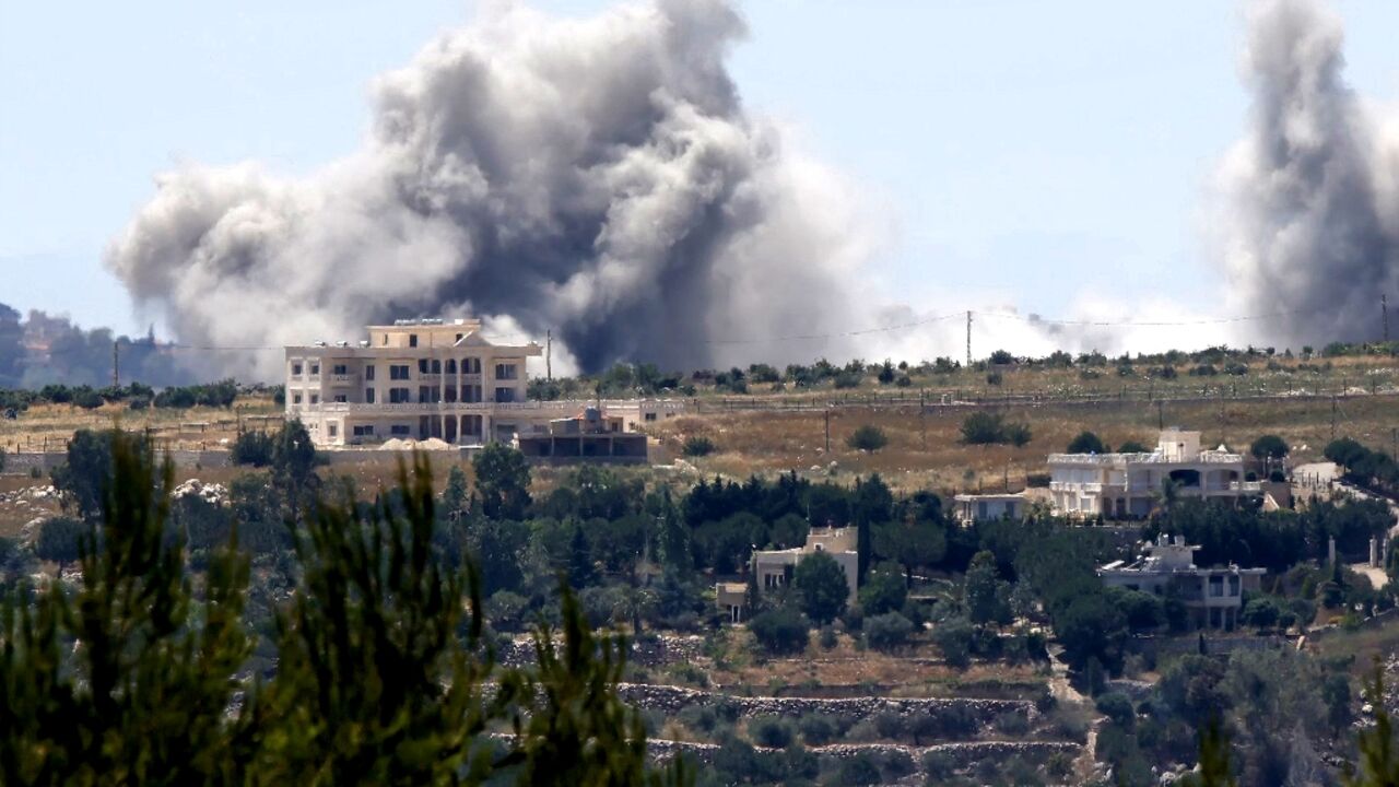Smoke rises from an Israeli bombardment near the village of Kfar Tibnit in southern Lebanon 