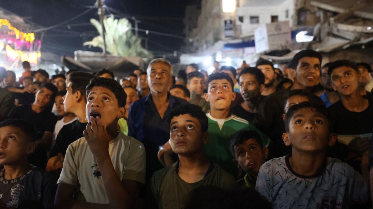 Palestinian football fans gathered to watch the World Cup Group on a giant screen
