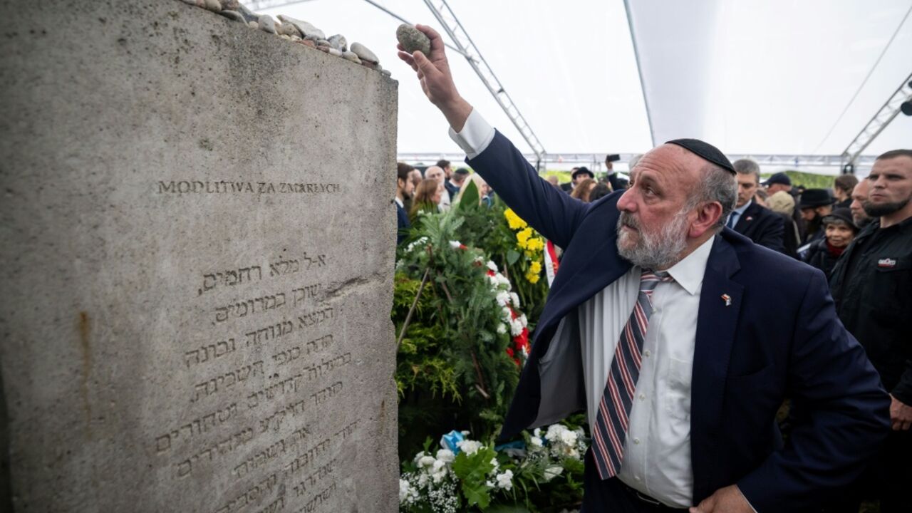 Chief Rabbi of Poland Michael Schudrich called for unity as demonstrations carried on outdoors