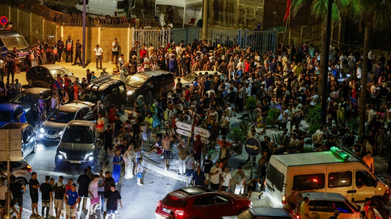 Hundreds of migrants gather in the Moroccan town next to the Spanish enclave of enclave of Ceuta