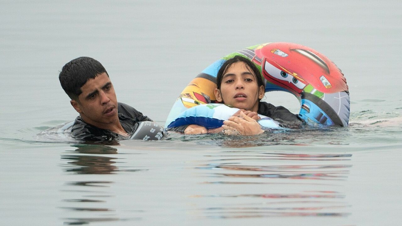 A local official said 60,000 migrants had entered Cueta. Spain's interior ministry said 25,000 of them had voluntarily returned to Morocco