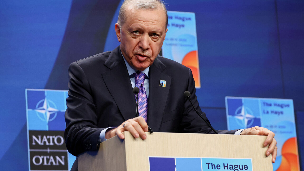 FILE PHOTO: Turkey's President Tayyip Erdogan speaks during a press conference at the NATO summit in The Hague, Netherlands June 25, 2025. REUTERS/Piroschka Van De Wouw/File Photo