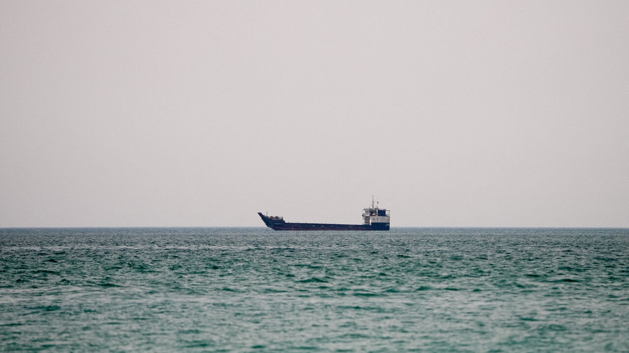 A vessel at the Strait of Hormuz, as seen from Musandam, Oman, June 29, 2026. REUTERS/Stringer