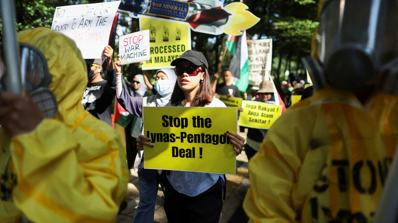 Malaysian activists hold placards bearing slogans, protesting Lynas Corp's four-year rare earth supply agreement with the U.S. Department of Defense in Malaysia, which hosts the world's largest rare earth processing plant outside China operated by Australia's Lynas Corp, at Kuala Lumpur, Malaysia, July 6, 2026. REUTERS/Hasnoor Hussain