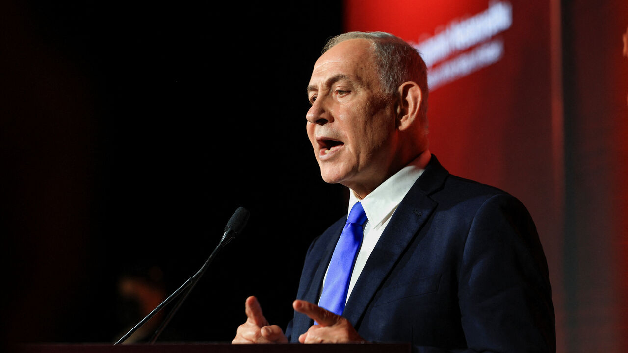 Israeli Prime Minister Benjamin Netanyahu speaks at the JNS (Jerusalem News Syndicate) International Policy Summit in Jerusalem, June 21, 2026. REUTERS/Ronen Zvulun
