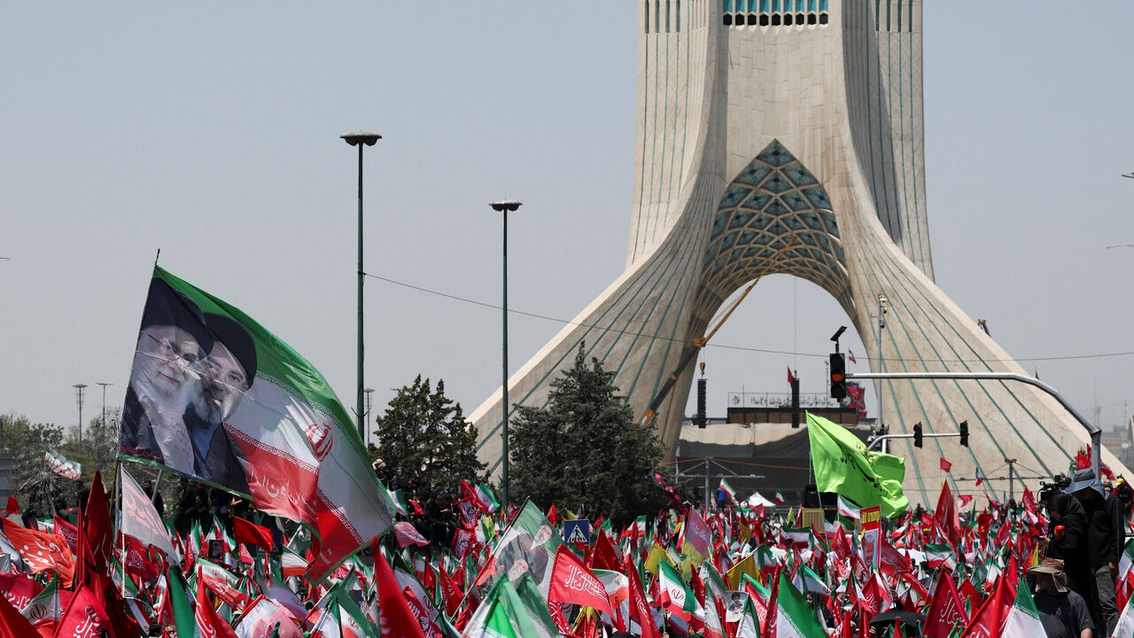 Mourners gather on the day of a funeral procession for Iran's late Supreme Leader Ayatollah Ali Khamenei, who was killed on February 28 in Israeli and U.S. airstrikes, in Tehran, Iran, July 6, 2026. REUTERS/Mohammed Salem