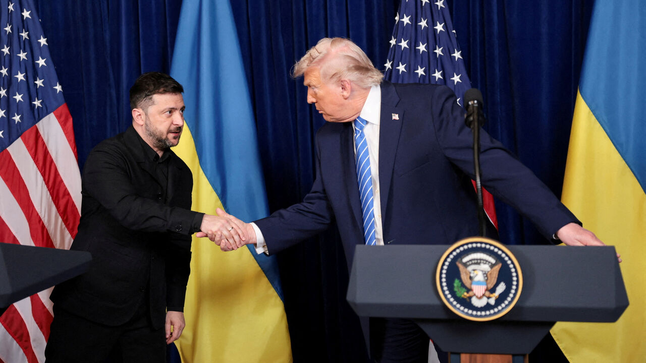 FILE PHOTO: U.S. President Donald Trump and Ukrainian President Volodymyr Zelenskiy shake hands during a press conference after their lunch meeting at Trump’s Mar-a-Lago club, in Palm Beach, Florida, U.S., December 28, 2025. REUTERS/Jonathan Ernst/File Photo
