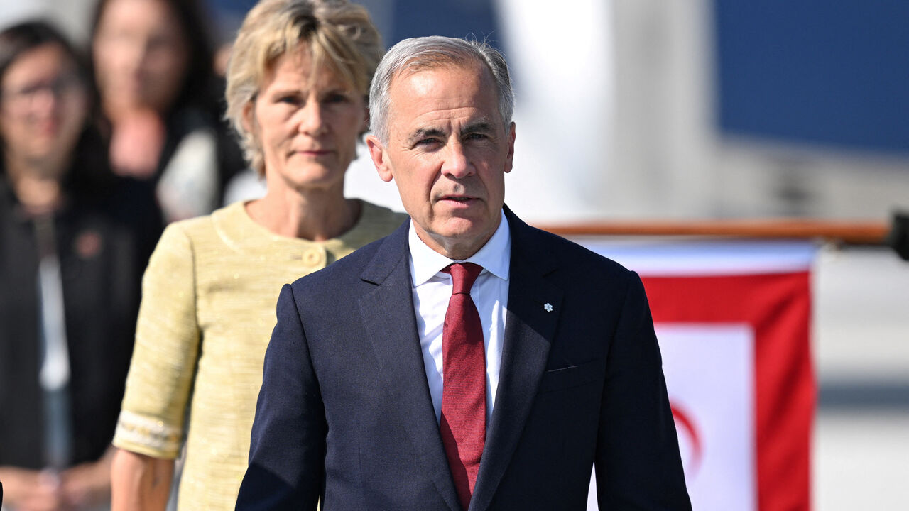ANKARA, TURKIYE - JULY 07: Canadian Prime Minister Mark Carney and his wife, Diana Fox Carney, arrive at Ankara Airport to attend the 36th NATO Heads of State and Government Summit in Ankara, Turkey, on July 07, 2026.   Muhammed Abdullah Kurtar/Pool via REUTERS