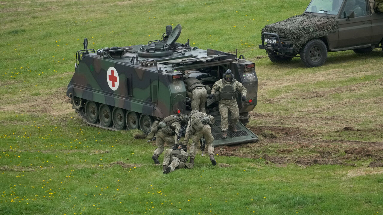 FILE PHOTO: Servicemen take part in the "Brave Griffin 26/II" military exercise near the strategically crucial Suwalki gap in Akmenynai, Lithuania May 6, 2026. REUTERS/Ints Kalnins/File Photo