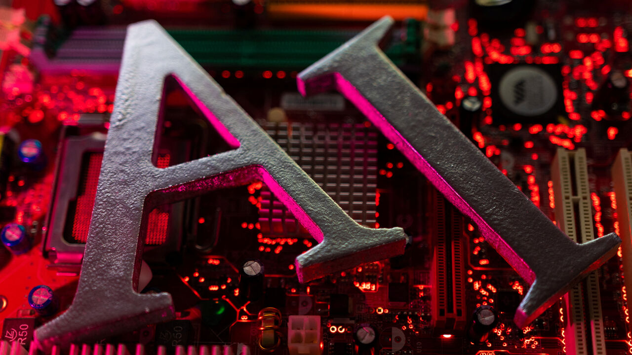 AI (Artificial Intelligence) letters are placed on computer motherboard in this illustration taken, June 23, 2023. REUTERS/Dado Ruvic/Illustration