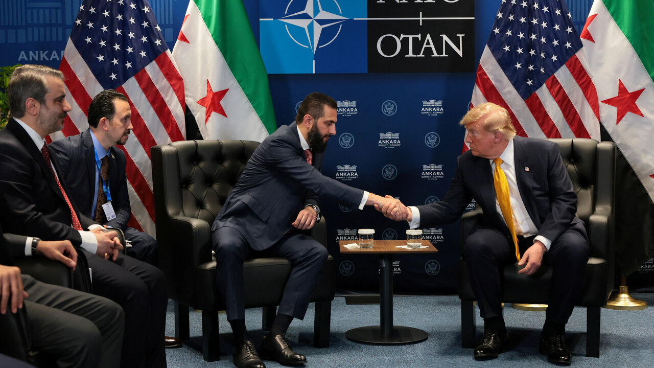 U.S. President Donald Trump shakes hands with Syrian President Ahmed al-Sharaa during a bilateral meeting alongside the NATO leaders summit at the Bestepe Presidential Compound in Ankara, Turkey, July 8, 2026. REUTERS/Jonathan Ernst