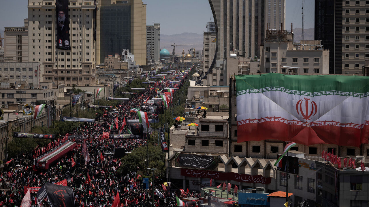 Mourners attend a funeral procession on the day of the burial of Iran's late Supreme Leader Ayatollah Ali Khamenei, who was killed on February 28 in Israeli and U.S. airstrikes, in Mashhad, Iran, July 9, 2026. REUTERS/Alkis Konstantinidis