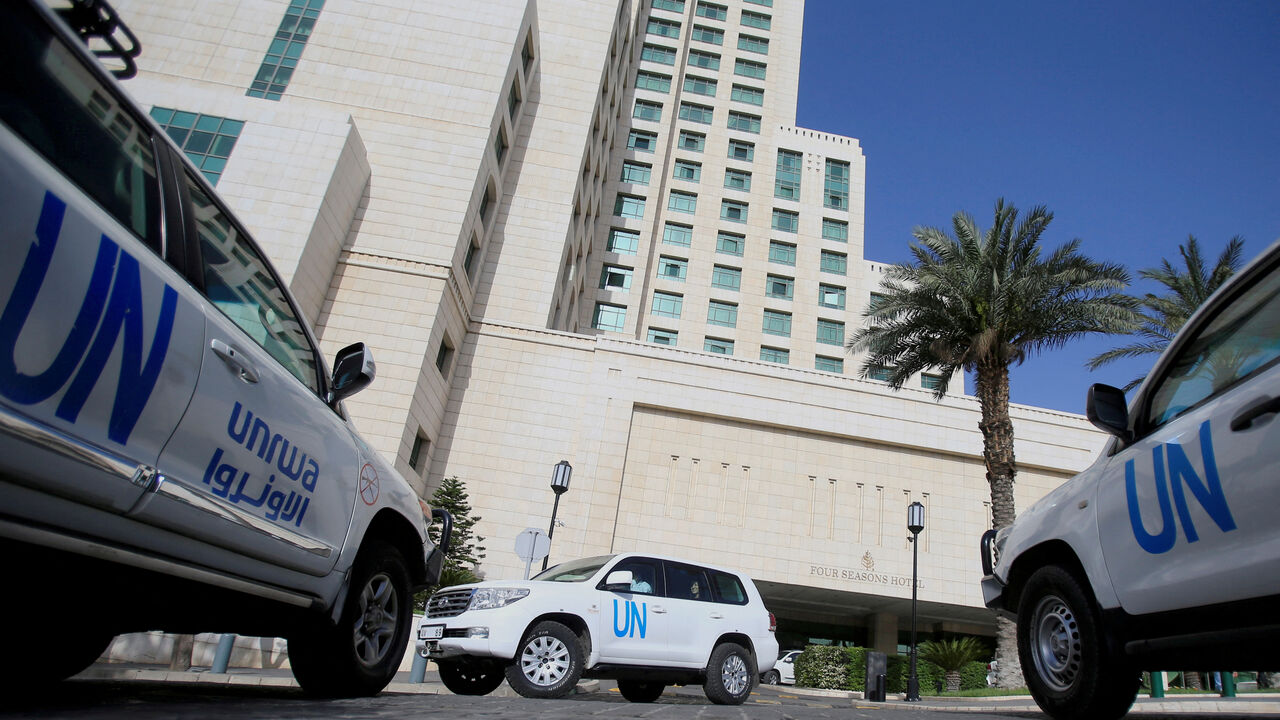 FILE PHOTO: The United Nation vehicles carrying the Organisation for the Prohibition of Chemical Weapons (OPCW) inspectors is seen in Damascus, Syria April 18, 2018. REUTERS/ Ali Hashisho/File Photo