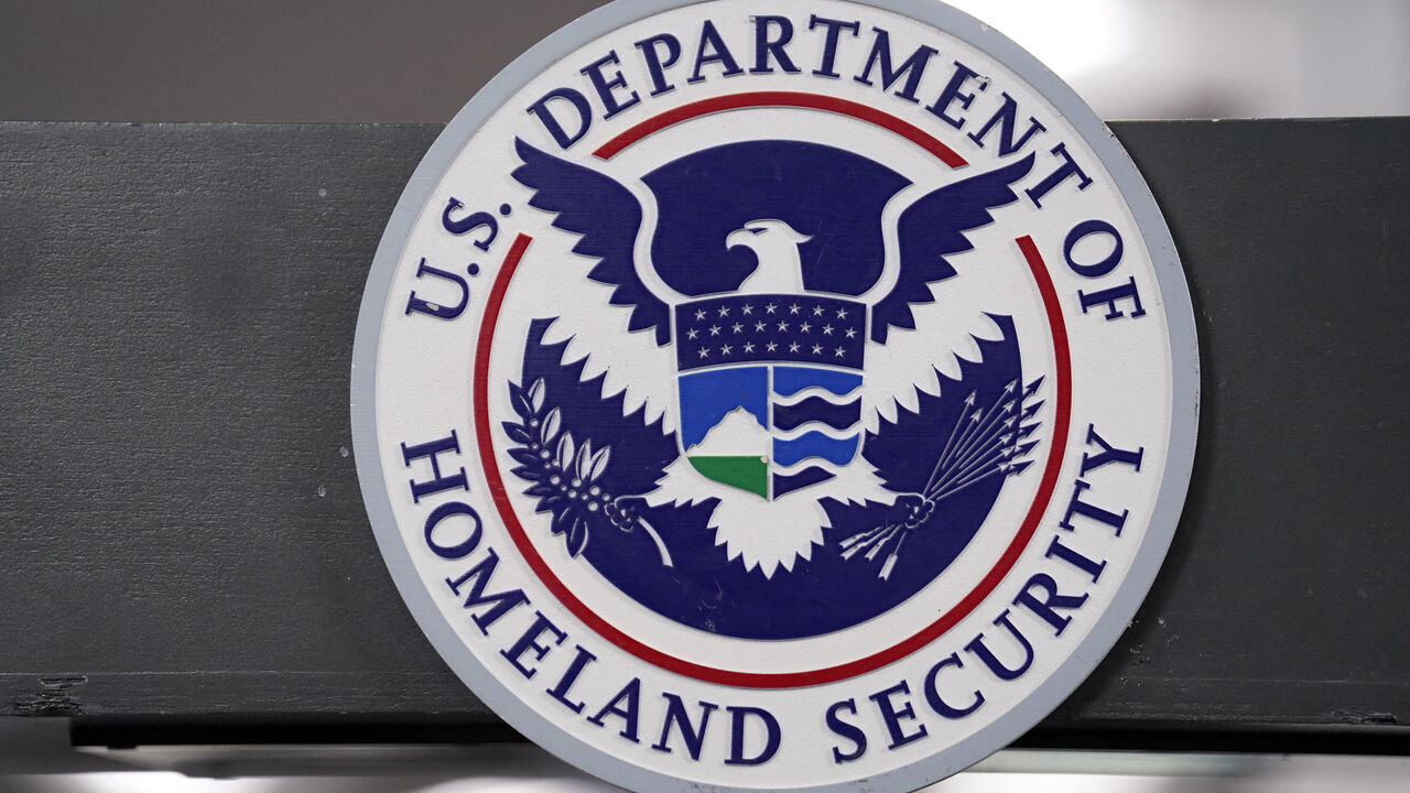 FILE PHOTO: The U.S. Department of Homeland Security seal is displayed ahead of an expected press conference at the FEMA National Response Coordination Center in Washington, D.C., U.S., January 24, 2026. REUTERS/Nathan Howard./File Photo