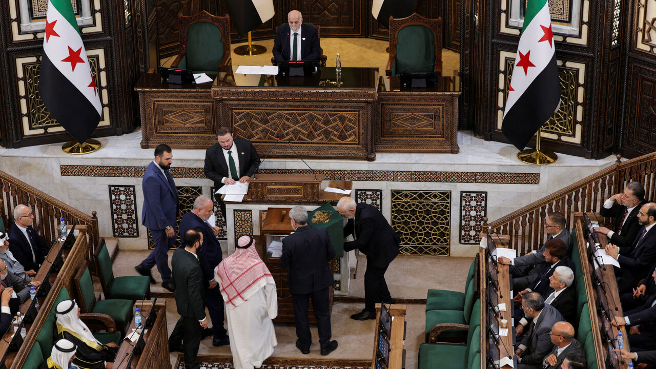 Members of Syria's newly formed People's Assembly attend the body's inaugural session, the first parliament session since the end of the rule of ousted Syrian President Bashar al-Assad, in Damascus, Syria, July 12, 2026. REUTERS/Khalil Ashawi