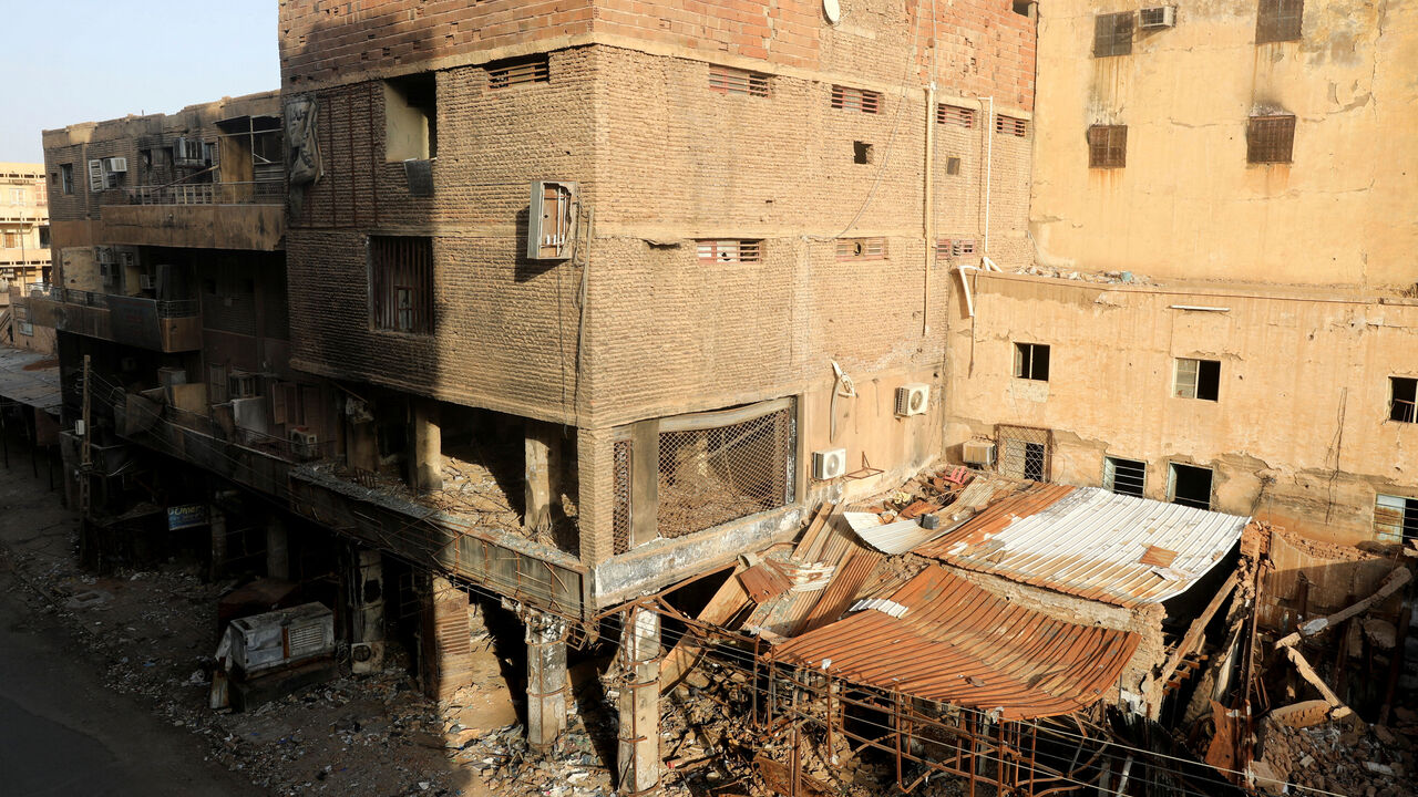 FILE PHOTO: Burnt shops lies down closed in downtown in Khartoum, Sudan June 25, 2026. REUTERS/El Tayeb Siddig/File Photo