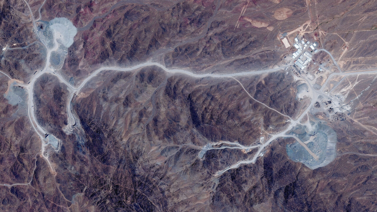 FILE PHOTO: A satellite view shows tunnel entrances at Pickaxe Mountain, of the Natanz nuclear facility, near Natanz, Iran, June 30, 2026. Vantor/Handout via REUTERS/File Photo