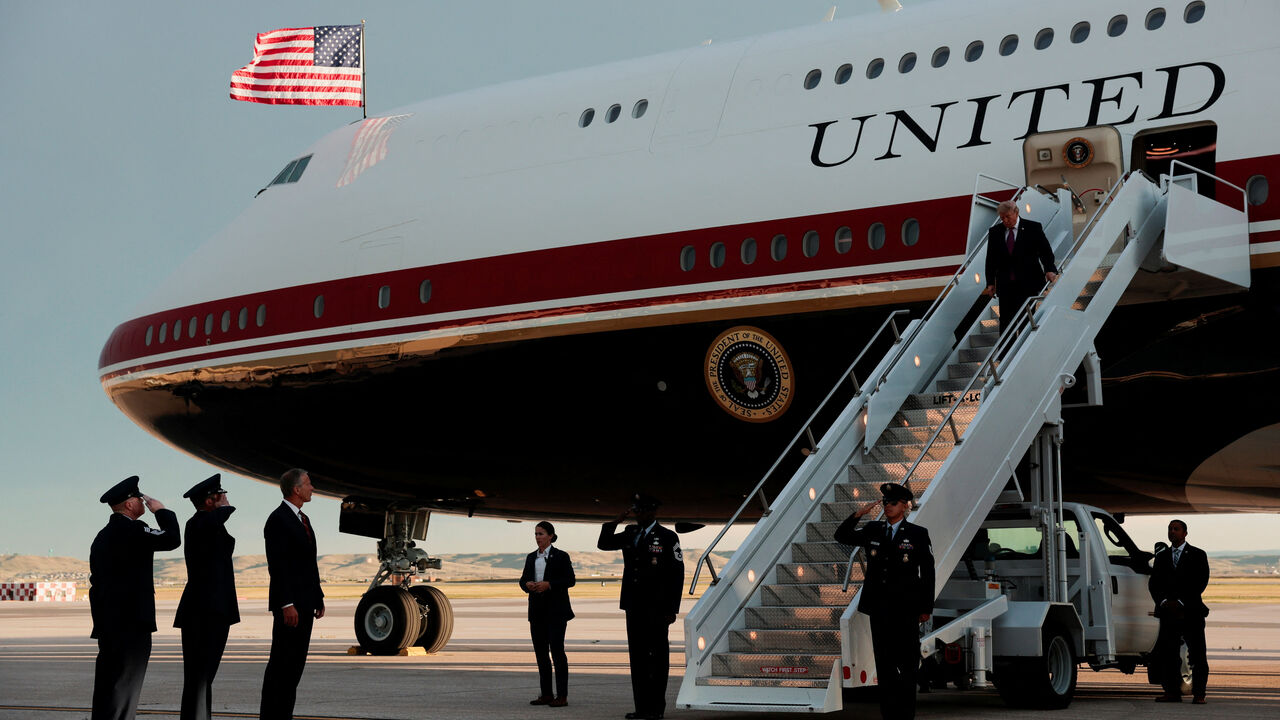 FILE PHOTO: U.S. President Donald Trump deboards the new Air Force One, a plane gifted by Qatar, upon arrival at Ellsworth Air Force Base in Belle Fourche-Cheyenne Valleys, South Dakota, U.S., July 3, 2026. REUTERS/Kylie Cooper/File Photo