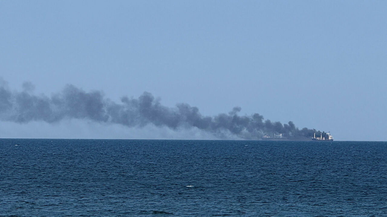 FILE PHOTO: Smoke rises from a civilian vessel on fire, amid Russia's attack on Ukraine, in Odesa, Ukraine July 19, 2026. Picture taken with a mobile phone. REUTERS/Stringer/File Photo