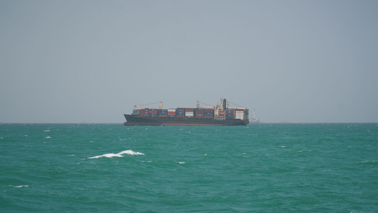 FILE PHOTO: A cargo ship sails in Saudi waters near the Dammam Port in Dammam, Saudi Arabia, May 17, 2026. REUTERS/Mohammed Benmansour/File Photo