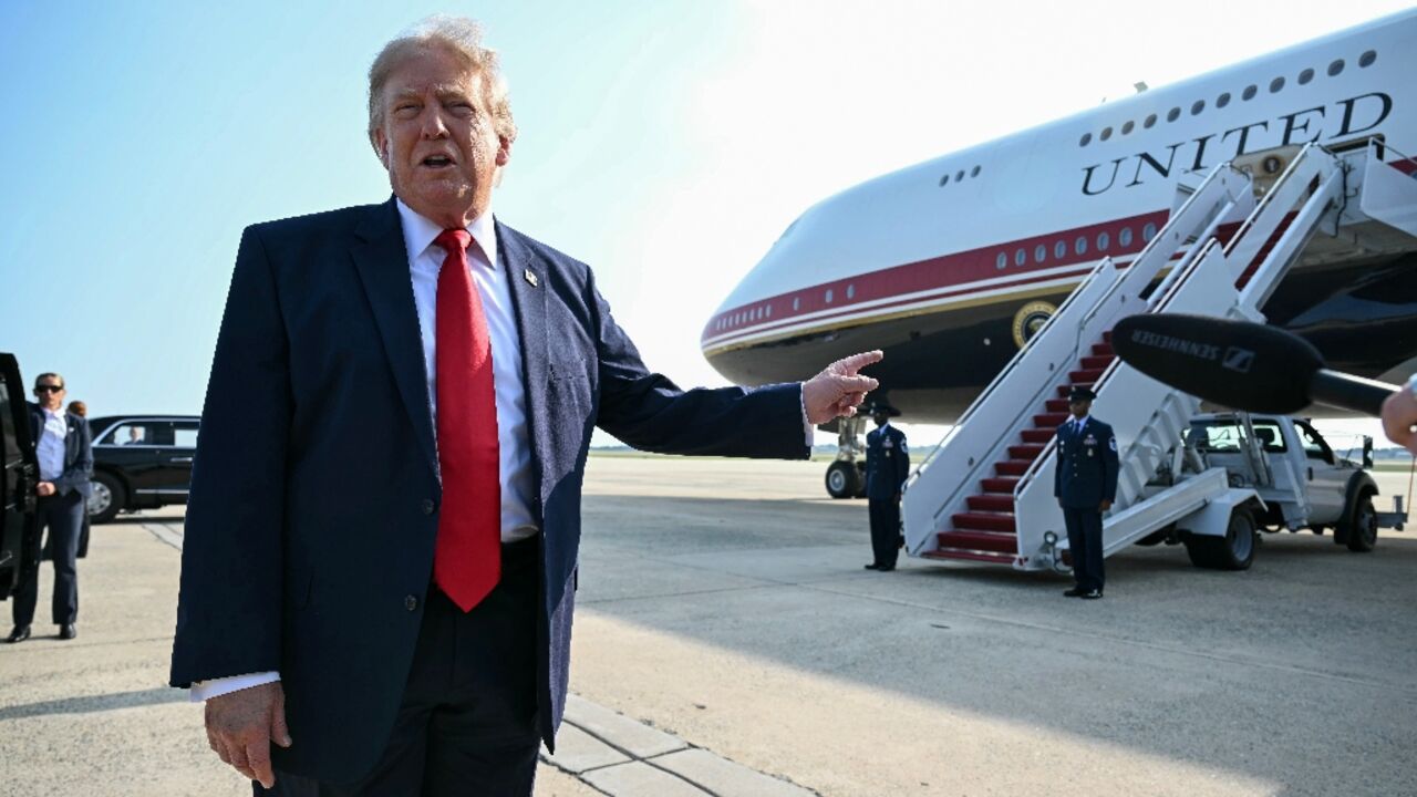 US President Donald Trump speaks to the press before he boards Air Force One for his first flight aboard the Boeing 747-8 that Qatar gifted the United States to use for executive travel