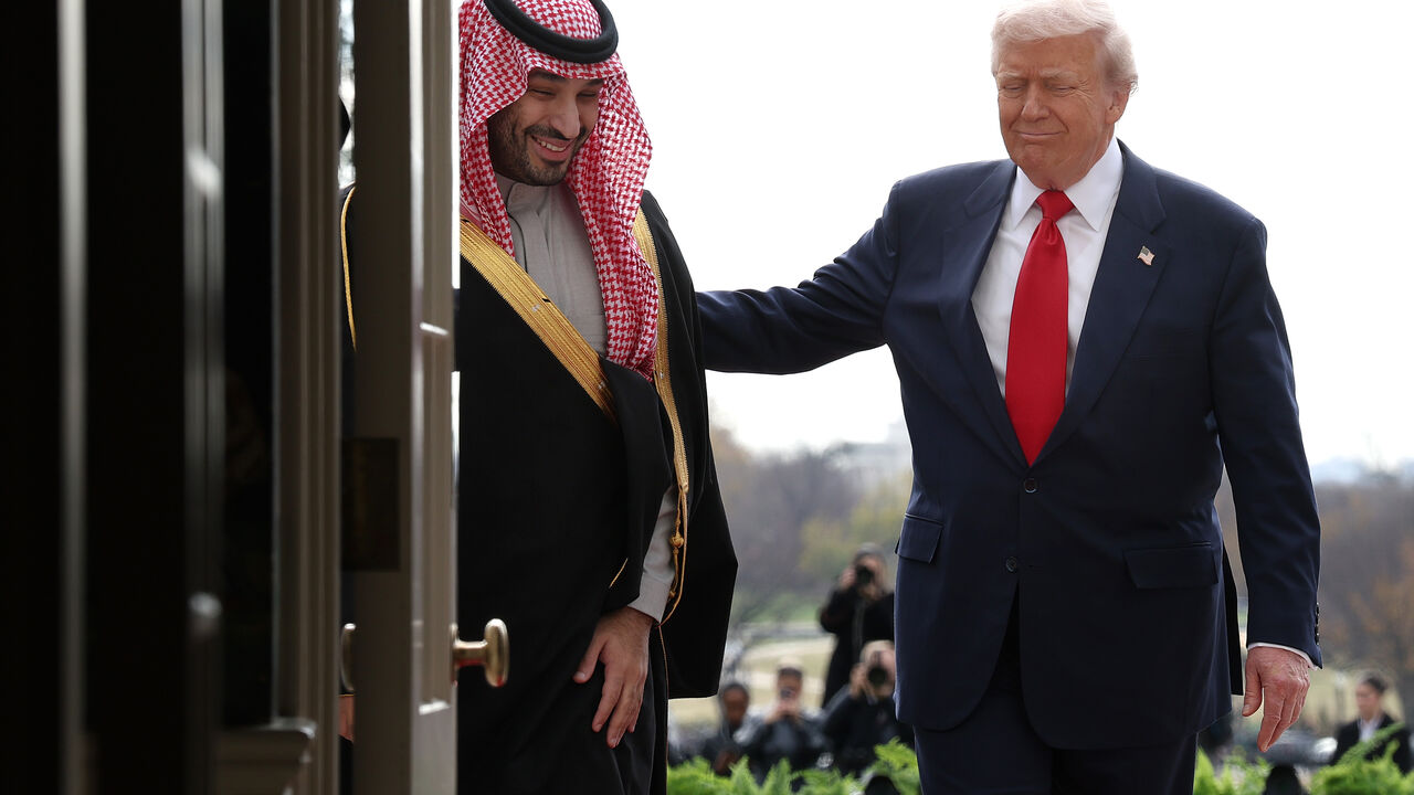 WASHINGTON, DC - NOVEMBER 18: U.S. President Donald Trump (R) welcomes Crown Prince and Prime Minister Mohammed bin Salman of Saudi Arabia during an arrival ceremony at the White House on November 18, 2025 in Washington, DC. Trump is hosting the crown prince for meetings aimed at strengthening economic and defense ties, including the U.S. sale of F-35 fighter jets to Saudi Arabia. (Photo by Win McNamee/Getty Images)