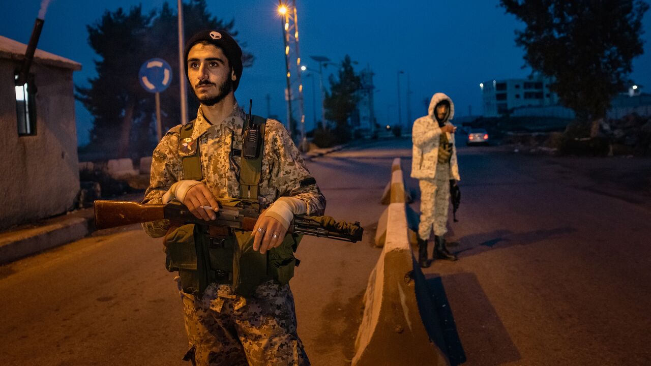 Druze National Guard volunteers at a checkpoint in Suwayda amid renewed clashes with government forces