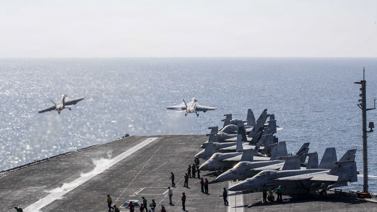In this handout photo provided by the US Navy, Two F/A-18 Super Hornets launch from the flight deck of Nimitz-class aircraft carrier USS Abraham Lincoln (CVN 72) in support of Operation Epic Fury on March 3, 2026 in the Mediterranean Sea. 