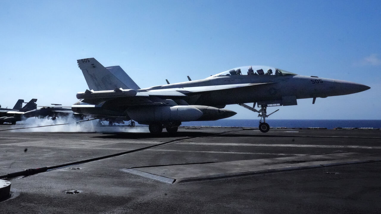 An EA-18G Growler assigned to Electric Attack Squadron (VAQ) 137 lands aboard the aircraft carrier USS Theodore Roosevelt (CVN-71) while the ship is moored in Honolulu, Hawaii, during Exercise RIMPAC (Rim of the Pacific) 2026 on July 17, 2026. 