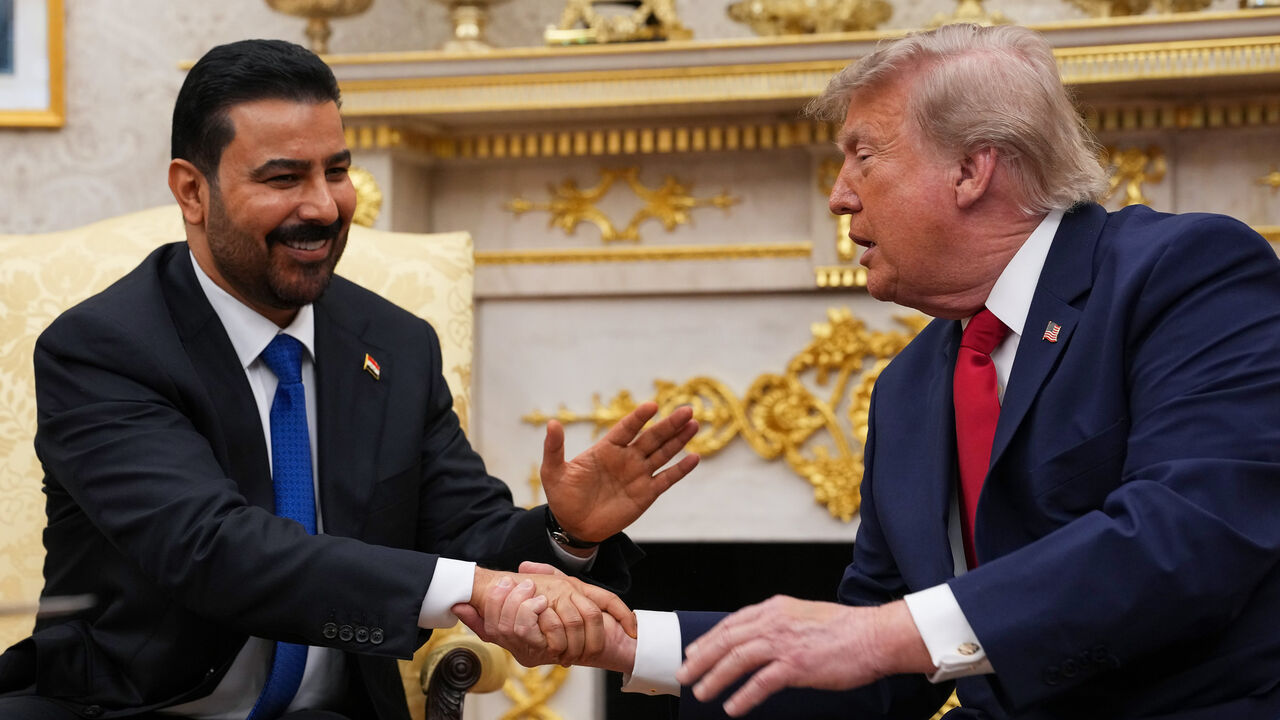 US President Donald Trump (R) shakes hands with Prime Minister of Iraq Ali al-Zaidi during a bilateral meeting in the Oval Office of the White House, Washington, July 14, 2026.