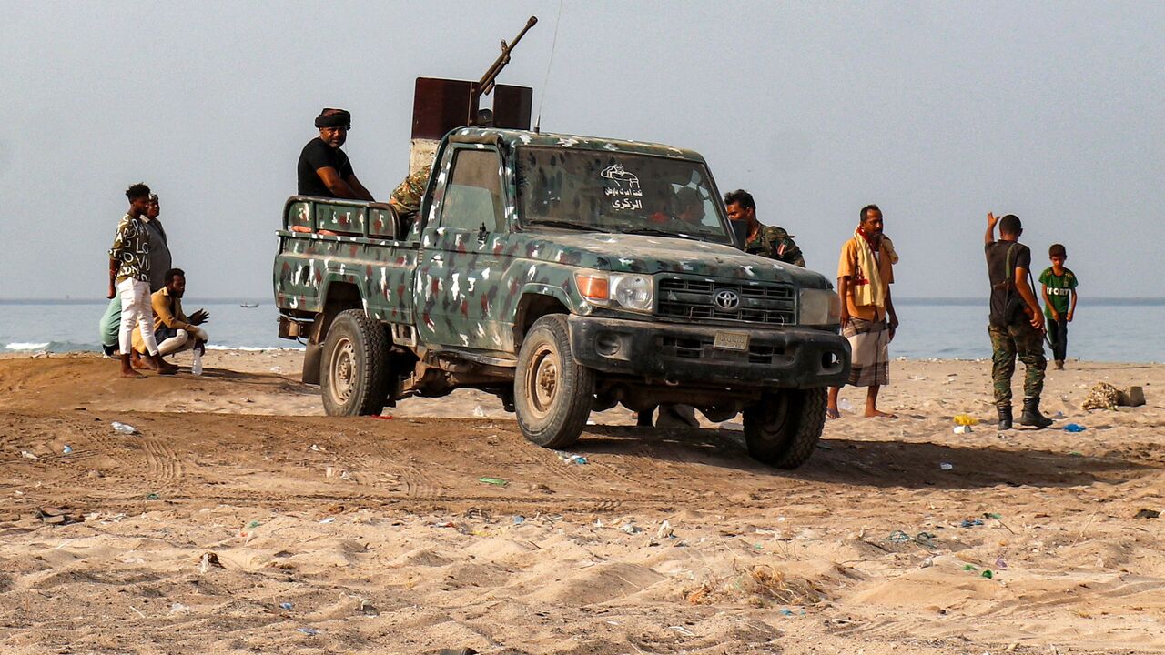 A pickup truck carrying a turret is pictured as fighters supporting the Aden-based and internationally recognized Yemeni government gather along the Red Sea shore in Khokha, in Yemen's western Hodeidah province on July 20, 2026.