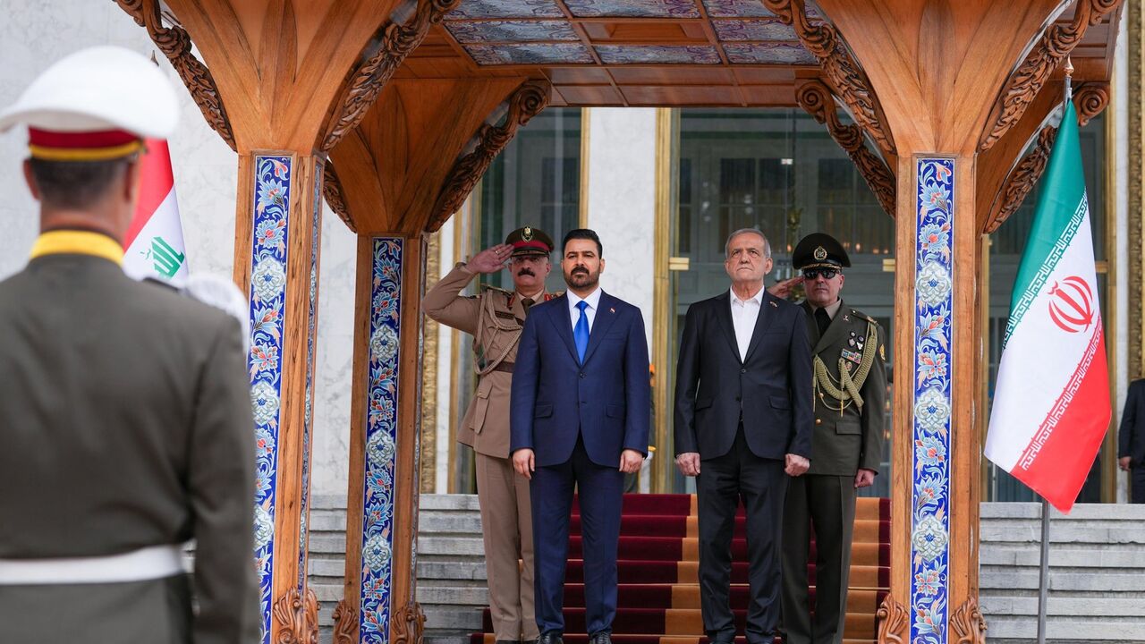 Iraqi Prime Minister Ali al-Zaidi is welcomed to the Saadabad Palace in Tehran by Iranian President Masoud Pezeshkian, July 23, 2026.