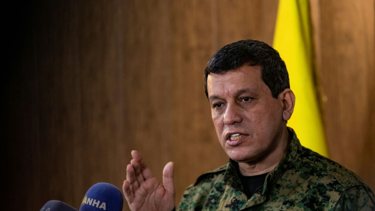 Kurdish SDF leader Mazloum Abdi has shown 'political flexibility and pragmatism', one of his confidants told AFP