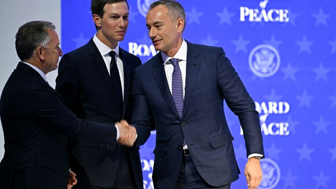 US Special Envoy Steve Witkoff (L) shakes hands with Nickolay Mladenov, Bulgarian High Representative for Gaza (R) next to US businessman Jared Kushner at the "Board of Peace" meeting during the World Economic Forum (WEF) annual meeting in Davos on January 22, 2026