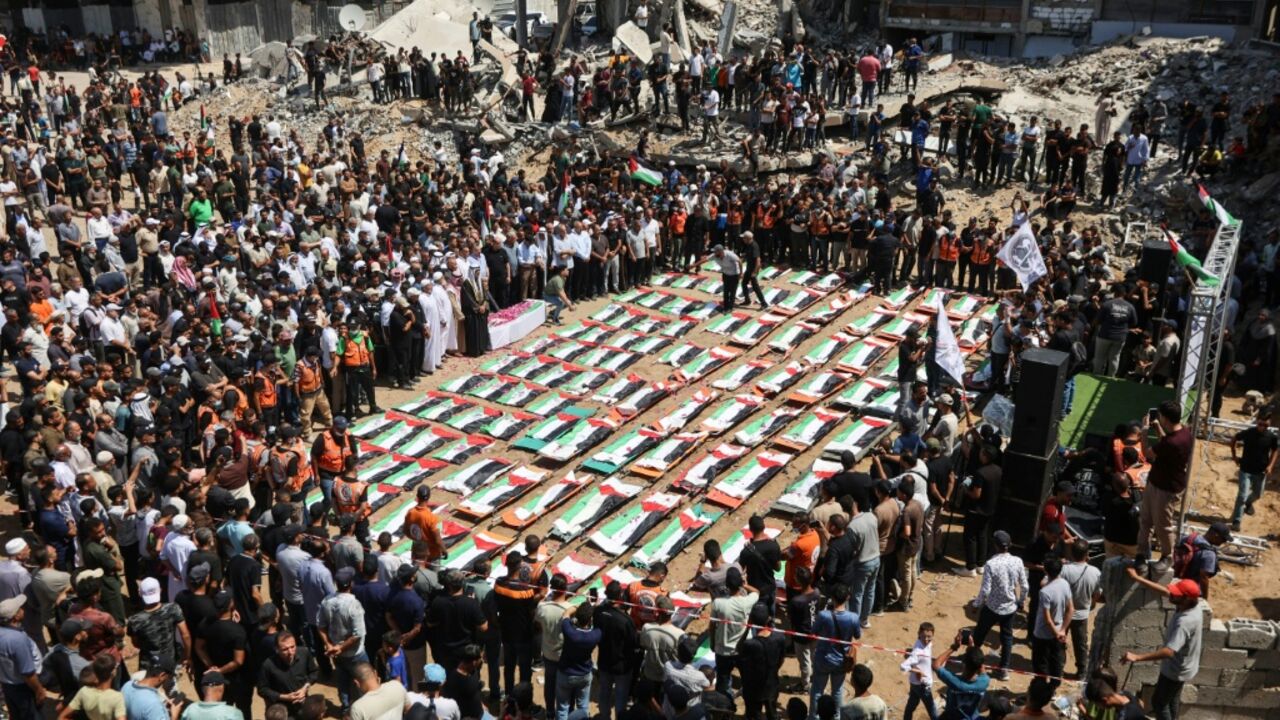 Gaza's civil defence agency says thousands of bodies are still trapped under the rubble in the territory