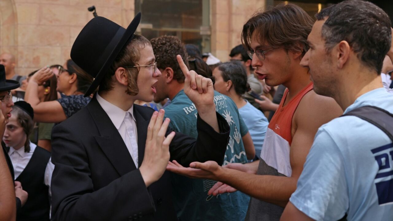 Ultra-Orthodox protesters demonstrate against Cafe Basimta operating on Shabbat, the weekly Jewish day of rest, as secular activists stage a counter-protest in support of the cafe, in central Jerusalem