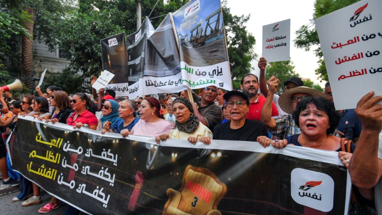 Demonstrators march in Tunis to protest against President Kais Saied, as well as water and electricty shortages