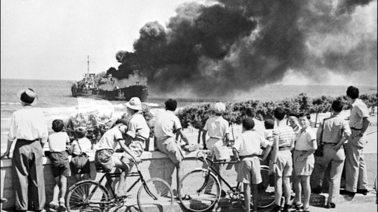 The Altalena ship carrying weapons for the Irgun paramilitary force burns near Tel Aviv on June 27, 1948 after being sunk on government orders