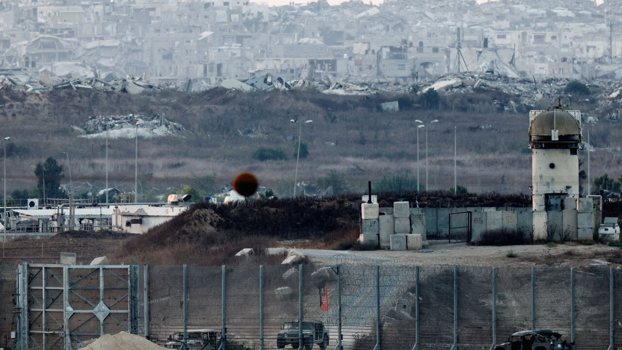 Military vehicles operate on the border with Gaza, as seen from the Israeli side of the border, August 2, 2026. REUTERS/Amir Cohen