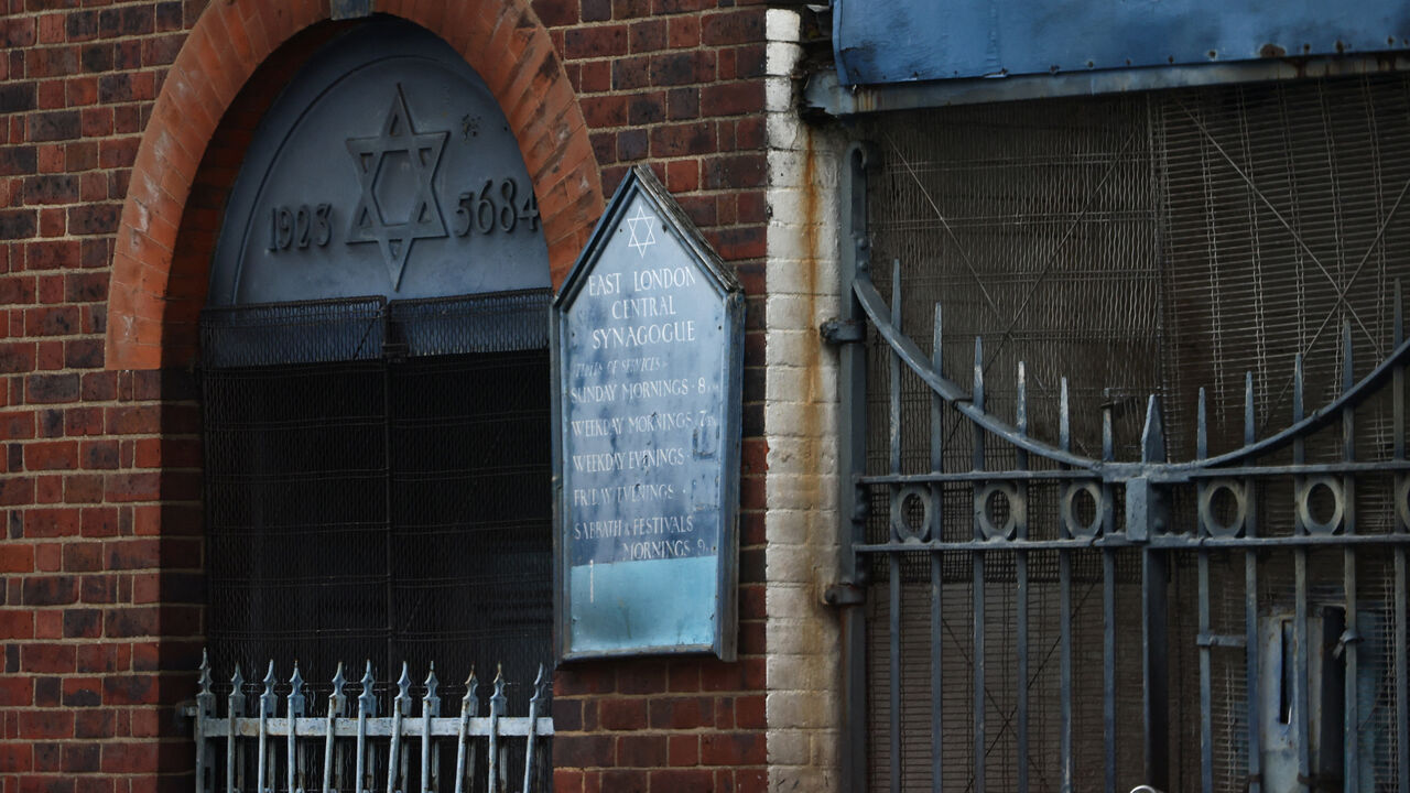 A sign hangs at the site of a suspected arson attack on a former synagogue in London, Britain May 5, 2026. REUTERS/Jack Taylor
