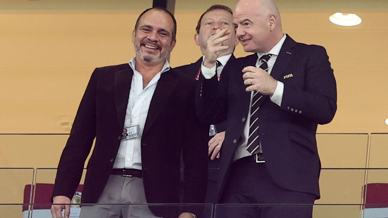 Soccer Football - Arab Cup - Group C - Saudi Arabia v Jordan - Education City Stadium, Al Rayyan, Qatar - December 1, 2021  Prince Ali bin Hussein the President of Jordan football association is seen with FIFA President Gianni Infantino in the stands REUTERS/Ibraheem Al Omari
