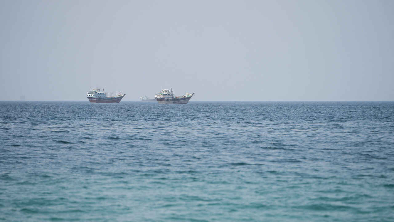 Vessels near the Strait of Hormuz, as seen from Musandam, Oman, August 6, 2026. REUTERS/Stringer