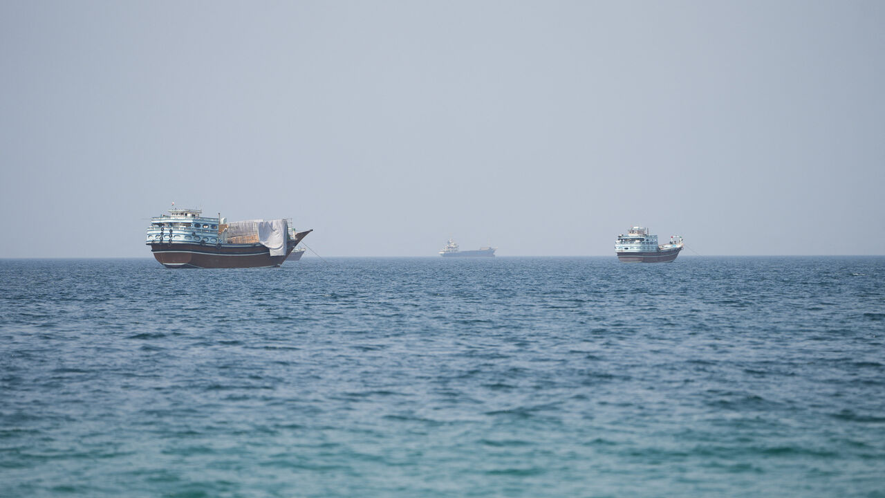 Vessels near the Strait of Hormuz, as seen from Musandam, Oman, August 6, 2026. REUTERS/Stringer