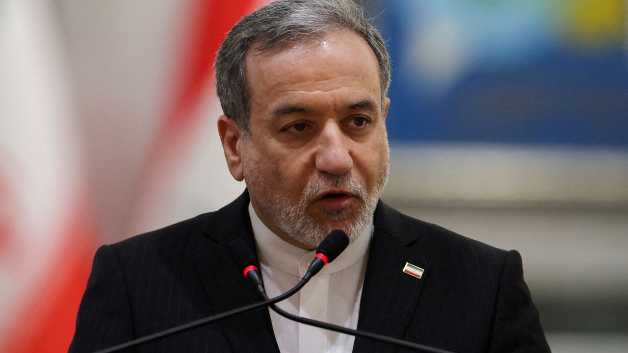 FILE PHOTO: Iranian Foreign Minister Abbas Araqchi attends a press conference alongside Iraqi Foreign Minister Fuad Hussein (not pictured), in Baghdad, Iraq, June 28, 2026. REUTERS/Thaier Al-Sudani/File Photo