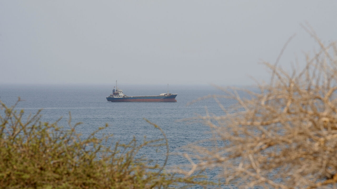 A vessel near the Strait of Hormuz, as seen from Musandam, Oman, August 10, 2026. REUTERS/Stringer