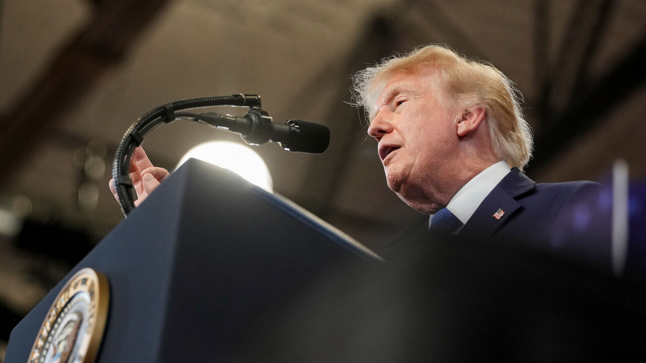U.S. President Donald Trump delivers remarks at David S. Mack Center for Training and Intelligence in Garden City, New York, U.S., August 14, 2026. REUTERS/Ken Cedeno
