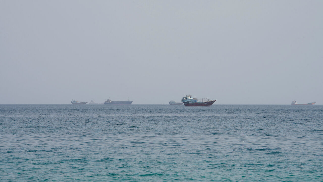 Vessels near the Strait of Hormuz, as seen from Musandam, Oman, August 10, 2026. REUTERS/Stringer